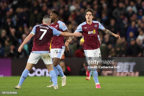 Nicolo Zaniolo of Aston Villa celebrates with teammate John McGinn after scoring their team's first goal during the Premier League match between...