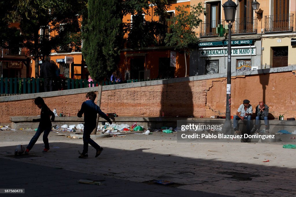Garbage Riots Children play football at Plaza Dos de Mayo surrounded by rubbish on ...
