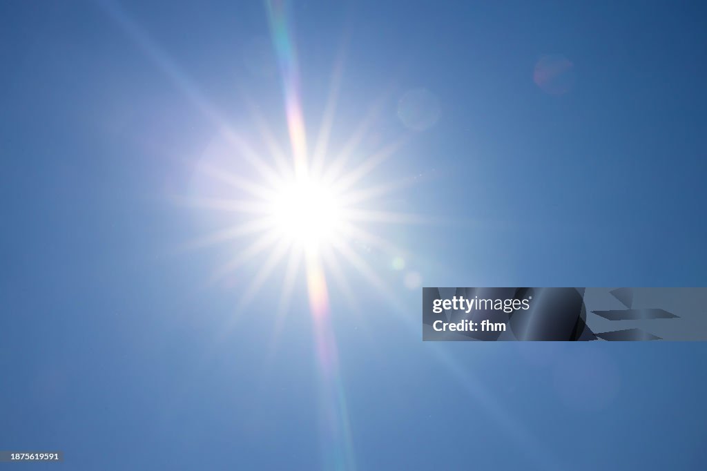 Full bright sun with blue sky