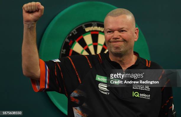 Raymond van Barneveld of The Netherlands celebrates after winning his match on Day Eight of the 2023/24 Paddy Power World Darts Championship at...