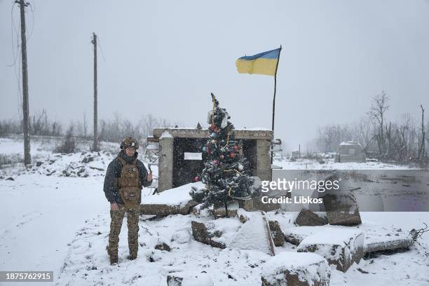 The military installed a Christmas tree at a destroyed checkpoint on a road which is constantly under fire from FPV drones on December 25, 2023 in...