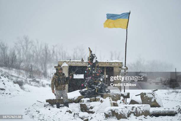 The military installed a Christmas tree at a destroyed checkpoint on a road which is constantly under fire from FPV drones on December 25, 2023 in...