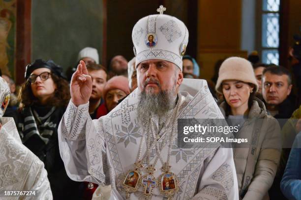 Metropolitan Epiphanius of Kyiv attends a Christmas service at the Saint Sophia Cathedral. This year, Ukrainians are marking their first Christmas on...