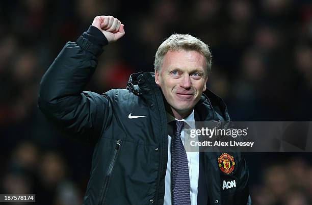 Manchester United Manager David Moyes celebrates at the end of the Barclays Premier League match between Manchester United and Arsenal at Old...