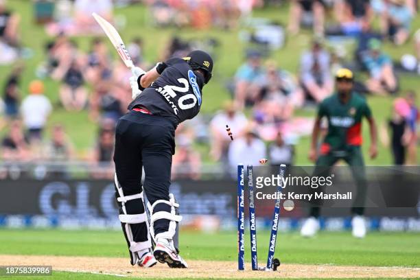 Adam Milne of New Zealand is bowled during game three of the Men's One Day International series between New Zealand and Bangladesh at McLean Park on...