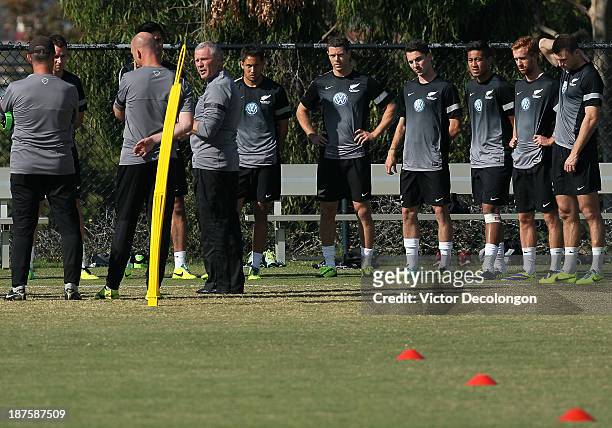 New Zealand Manager Ricki Herbert addresses his players during their training session at StubHub Center on November 10, 2013 in Los Angeles,...