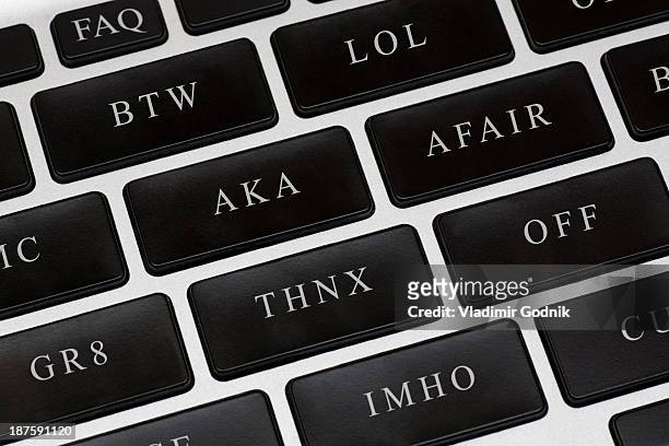 computer keypad of acronym buttons - western script font stock pictures, royalty-free photos & images