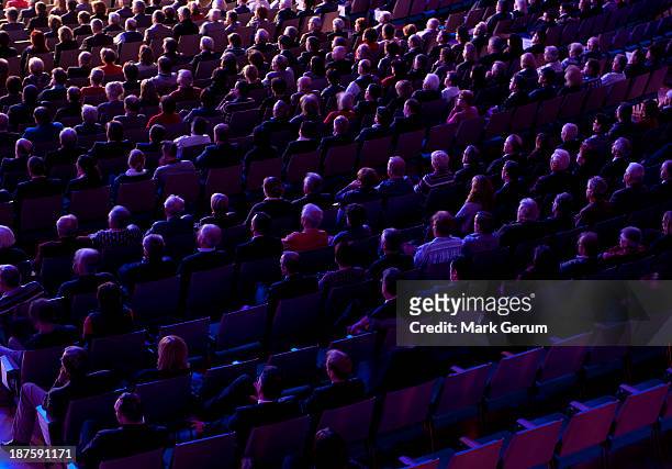 audience crowd at a presentation event - arts culture and entertainment stock pictures, royalty-free photos & images