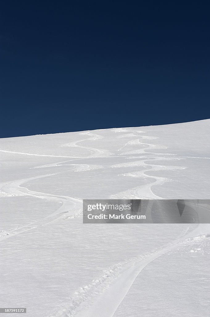 Ski tracks on slope on The Dolomites, South Tyrol, Italy,