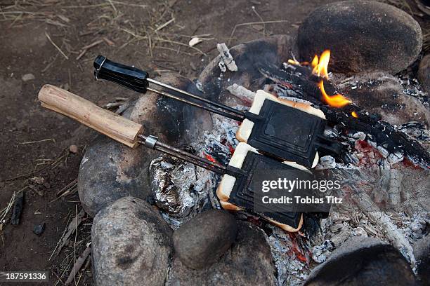 two toasted sandwich makers on the campfire in jindabyne, new south wales, australia - grillad sandwich bildbanksfoton och bilder