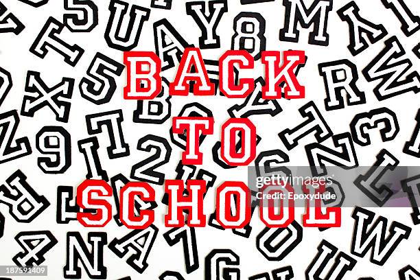 red outlined varsity font stickers spelling back to school on top of black outlined letters - varsity stock pictures, royalty-free photos & images