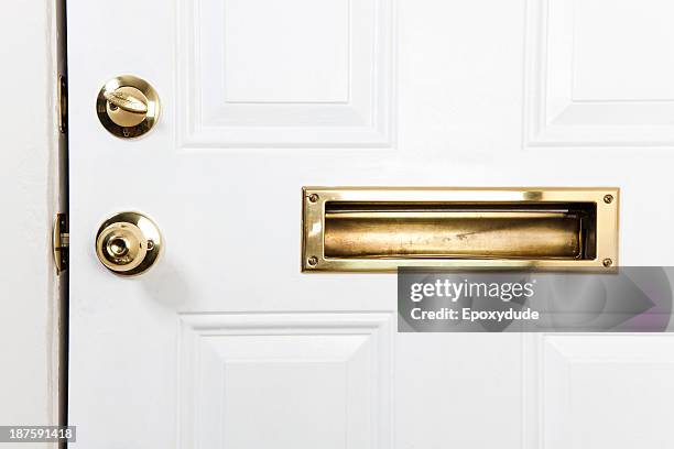a front door with mail slot, doorknob and deadbolt lock - ranhura para correio imagens e fotografias de stock