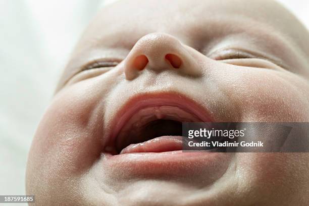 close up of smiling baby - extreme close up mouth stock pictures, royalty-free photos & images