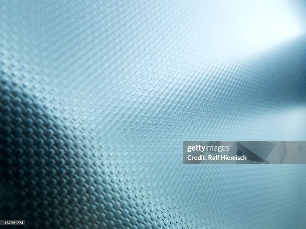A blue textured surface