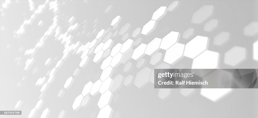 Hexagons connected into molecular like structures on a gray background