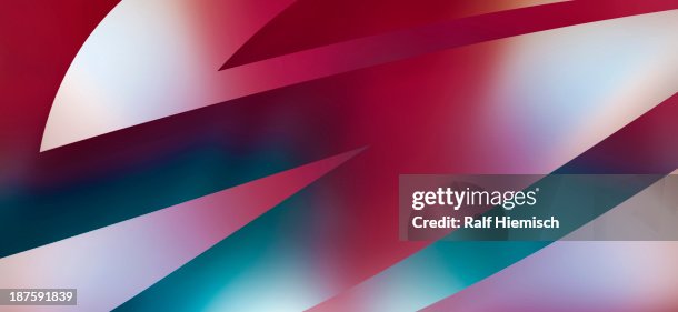 Futuristic sharp angle shapes on a multi colored background Futuristic sharp angle shapes on a multi colored background