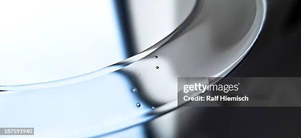 an abstract shiny silver surface with tiny drops on it - silver ストックフォトと画像