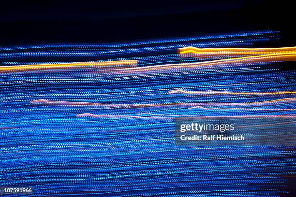 multicolored illuminated light trails - fast form stock illustrations