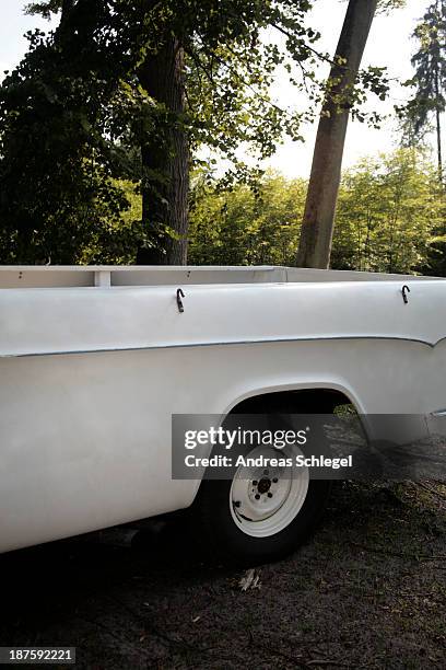 an old-fashioned pickup truck parked in a natural scene - truck side view stock pictures, royalty-free photos & images