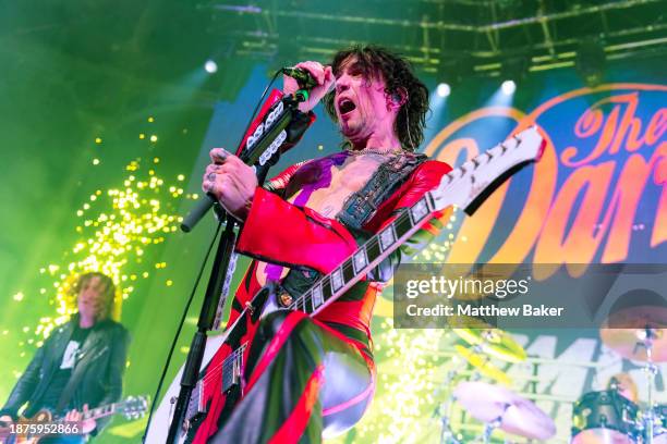 Dan Hawkins and Justin Hawkins of The Darkness perform at The Roundhouse on December 22, 2023 in London, England.