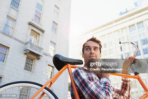 this bike takes me anywhere! - city life authentic stockfoto's en -beelden