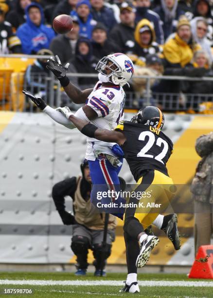 Steve Johnson of the Buffalo Bills pulls in the pass against William Gay of the Pittsburgh Steelers during the game on November 10, 2013 at Heinz...