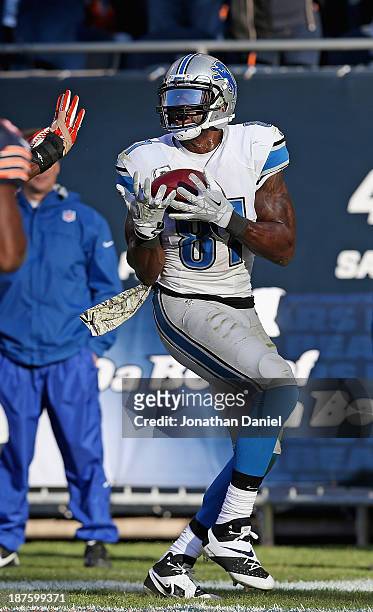 Calvin Johnson of the Detroit Lions makes the game-winning touchdown catch against the Chicago Bears at Soldier Field on November 10, 2013 in...