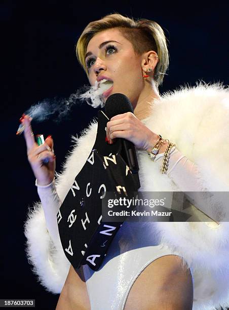 Miley Cyrus accepts award onstage during the MTV EMA's 2013 at the Ziggo Dome on November 10, 2013 in Amsterdam, Netherlands.