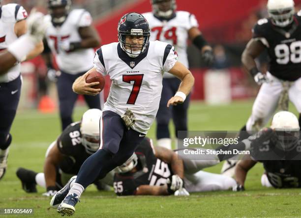 Quarterback Case Keenum of the Houston Texans runs with the ball against the Arizona Cardinals at University of Phoenix Stadium on November 10, 2013...