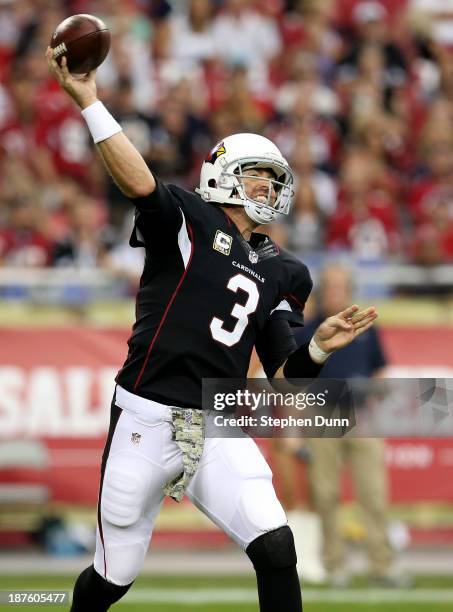 Quarterback Carson Palmer of the Arizona Cardinals throws a pass against the Houston Texans at University of Phoenix Stadium on November 10, 2013 in...