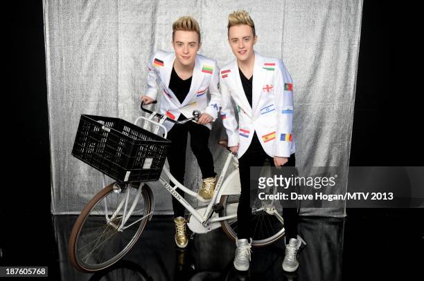 John and Edward Grimes of Jedward pose in the VIP Glamour Pit during the MTV EMA's 2013 at the Ziggo Dome on November 10, 2013 in Amsterdam,...
