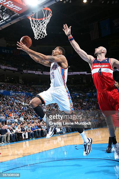 Thabo Sefolosha of the Oklahoma City Thunder goes up for the shot against the the Washington Wizards during an NBA game on November 10, 2013 at the...