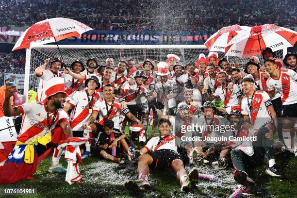 Pablo Solari of River Plate and teammates celebrate after winning the Trofeo de Campeones match between Rosario Central and River Plate at Estadio...