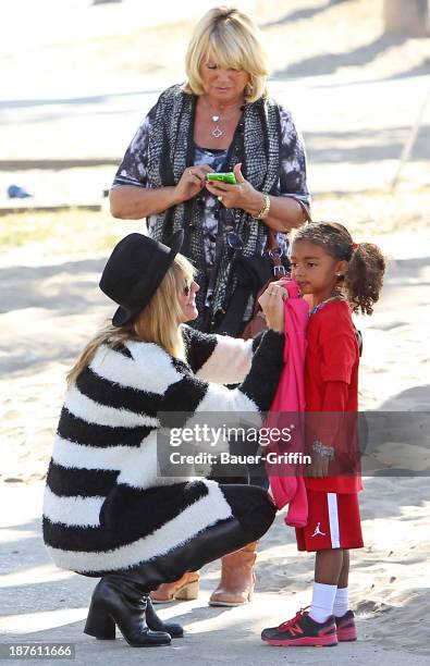 November 10: Heidi Klum, along with her mother, Erna Klum and daughter, Lou Samuel, are seen on November 10, 2013 in Los Angeles, California.