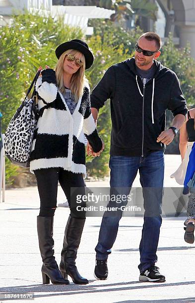 November 10: Heidi Klum and her boyfriend, Martin Kristen are seen on November 10, 2013 in Los Angeles, California.