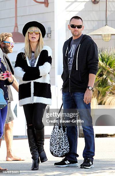 November 10: Heidi Klum and her boyfriend, Martin Kristen are seen on November 10, 2013 in Los Angeles, California.