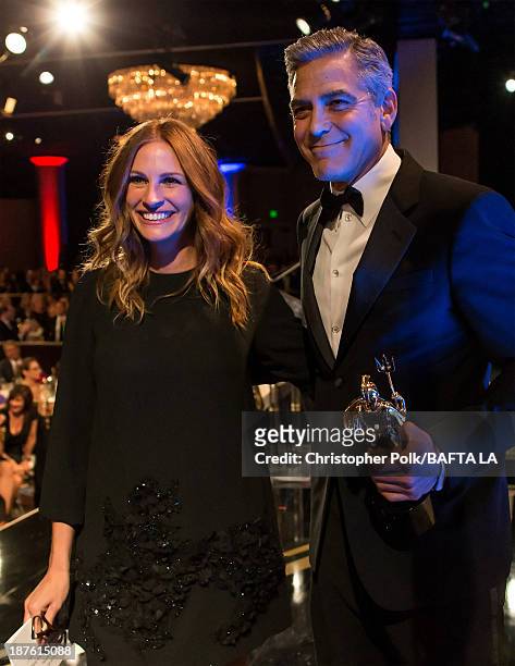Actors Julia Roberts and George Clooney attend the 2013 BAFTA LA Jaguar Britannia Awards presented by BBC America at The Beverly Hilton Hotel on...