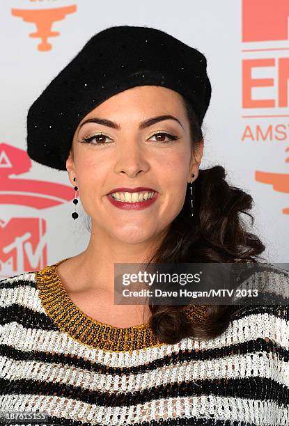 Caro Emerald poses in the Exclusive Arrivals Studio during MTV EMA's 2013 at the Ziggo Dome on November 10, 2013 in Amsterdam, Netherlands.