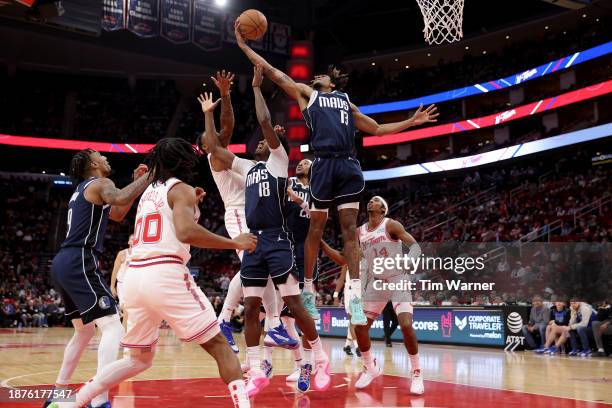 Greg Brown III of the Dallas Mavericks grabs a rebound in the second half against the Houston Rockets at Toyota Center on December 22, 2023 in...