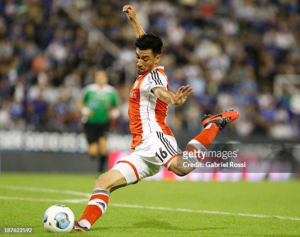 Ariel Rojas of River Plate hits the ball during a match between Velez Sarsfield and River Plate as part of round 15th of Torneo Inicial at Jose...