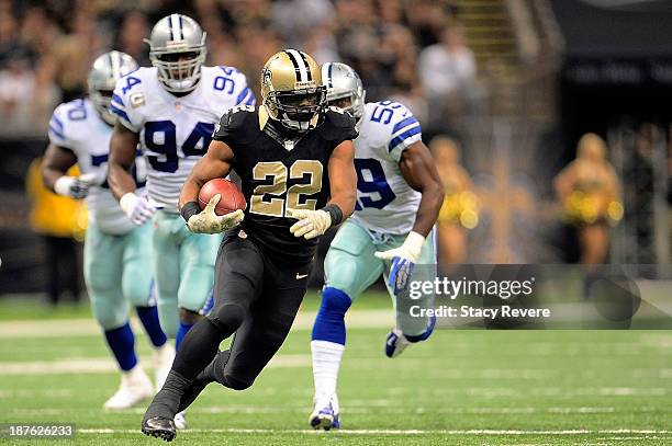 Ernie Sims of the Dallas Cowboys pursues Mark Ingram of the New Orleans Saints during a game at the Mercedes-Benz Superdome on November 10, 2013 in...