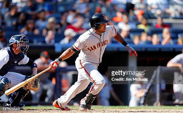 Tony Abreu of the San Francisco Giants in action against the New York Yankees at Yankee Stadium on September 21, 2013 in the Bronx borough of New...