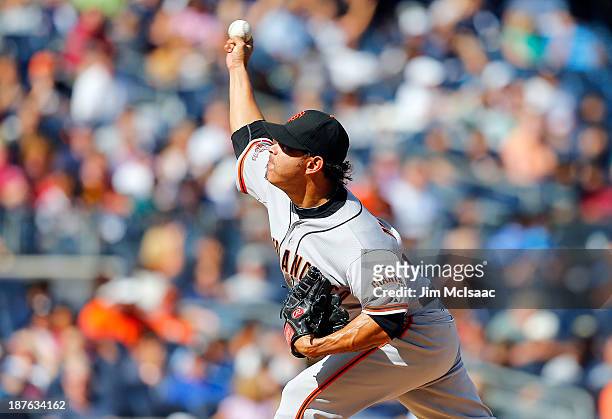 Guillermo Moscoso of the San Francisco Giants in action against the New York Yankees at Yankee Stadium on September 21, 2013 in the Bronx borough of...
