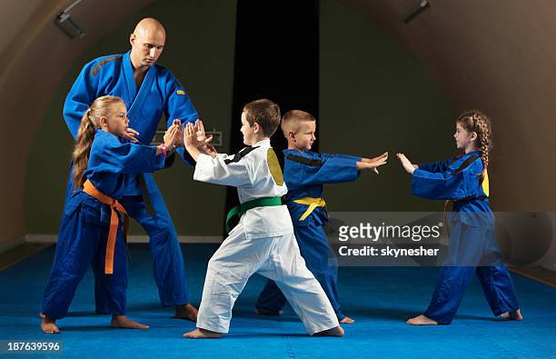 karate training. - martial arts stock pictures, royalty-free photos & images