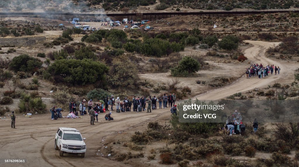 Migrants At The US-Mexico Border
