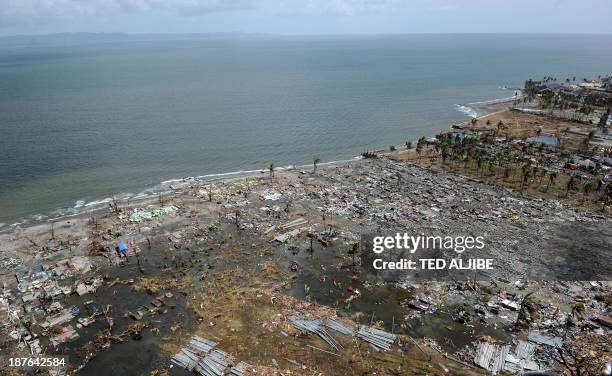 This aerial photo shows a devastated area in the city of Tacloban, Leyte province, in the central Philippines on November 11 only days after Super...