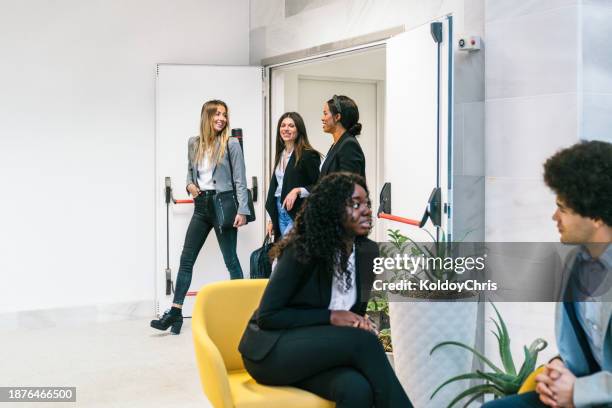 multicultural young business team enjoying a break in modern office - administrative professional day stock pictures, royalty-free photos & images