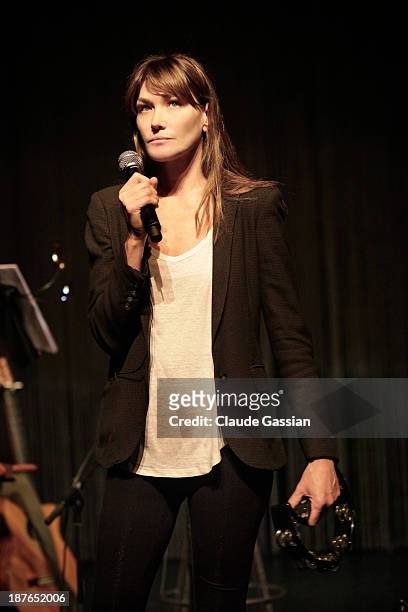 Singer Carla Bruni is photographed exclusively during rehearsals prior to performing in concert at the Espace Carpeaux on November 8, 2013 in...