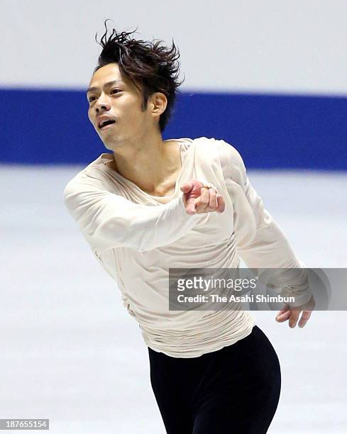 Daisuke Takahashi of Japan competes in the Men's Free Program during day two of the ISU Grand Prix of Figure Skating 2013/2014 NHK Trophy at Yoyogi...