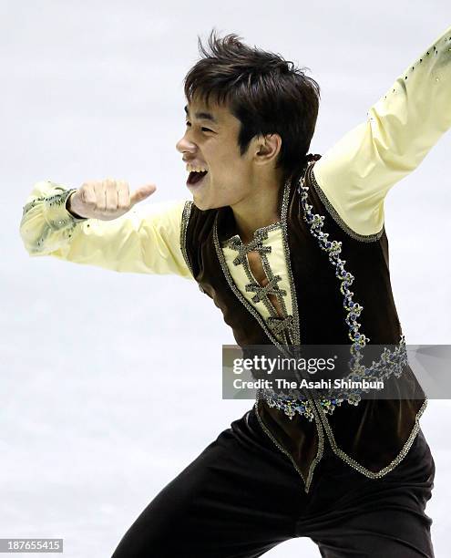 Nobunari Oda of Japan competes in the Men's Free Program during day two of the ISU Grand Prix of Figure Skating 2013/2014 NHK Trophy at Yoyogi...